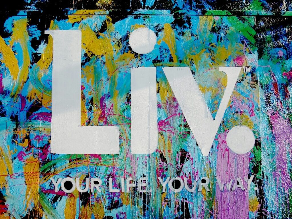 Colorful picture with the message 'Live your life your way.'